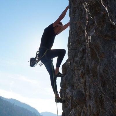 Mountain Climber Scaling a Rock Face in the North Okanagan