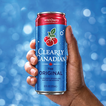 Wild Cherry can in hand