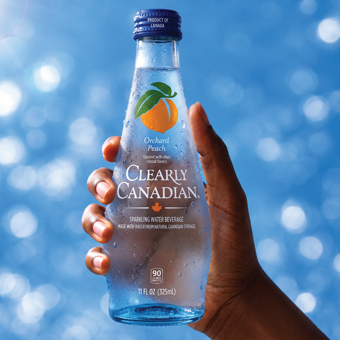 Orchard Peach bottle in hand