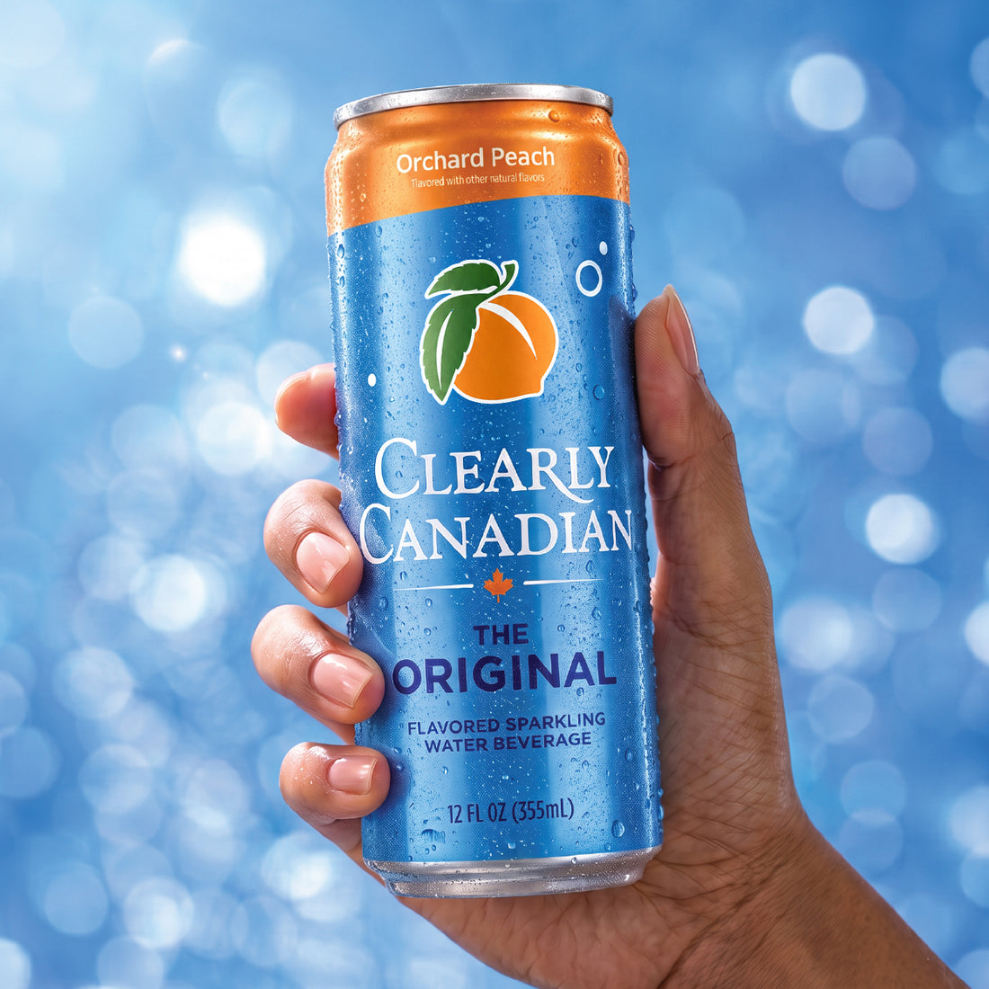 Orchard Peach can in hand