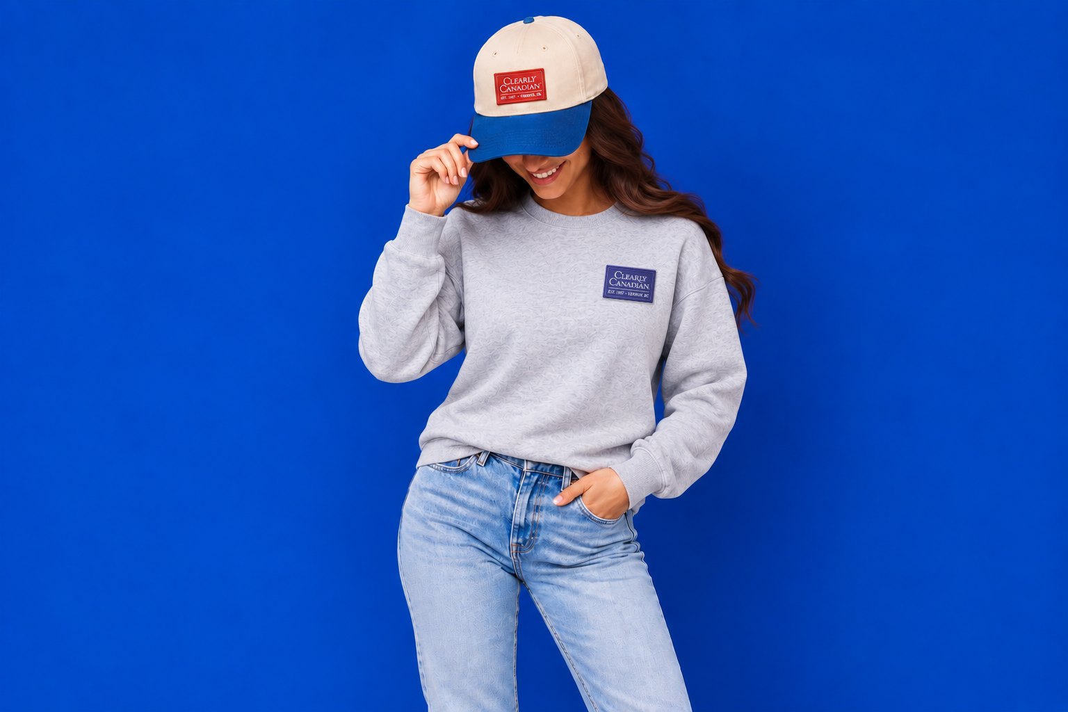 Clearly Canadian cap and grey crewneck with the small label