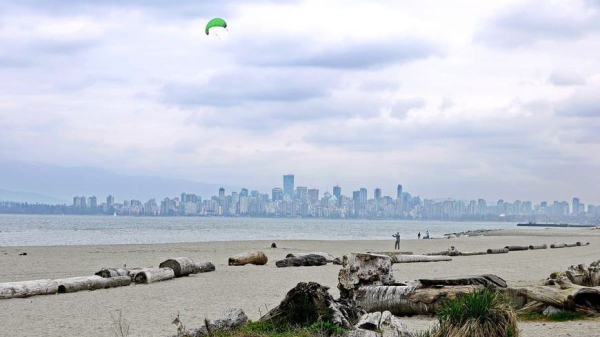 Sightseeing in Vancouver with a view of downtown Vancouver from the Spanish Banks